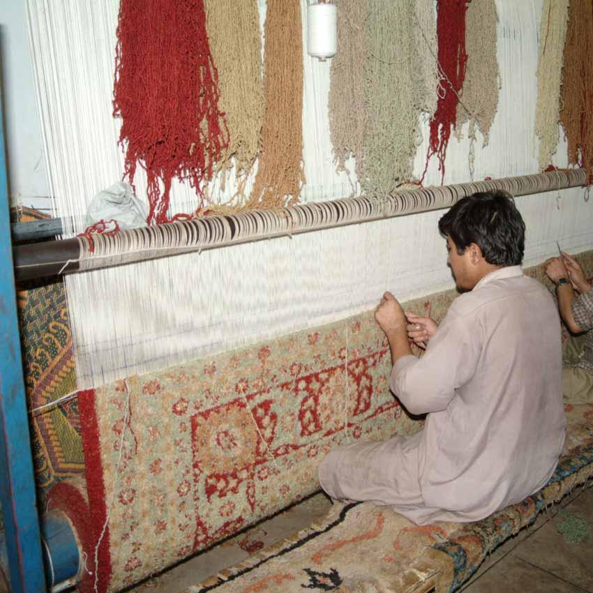 Weaving on an upright loom